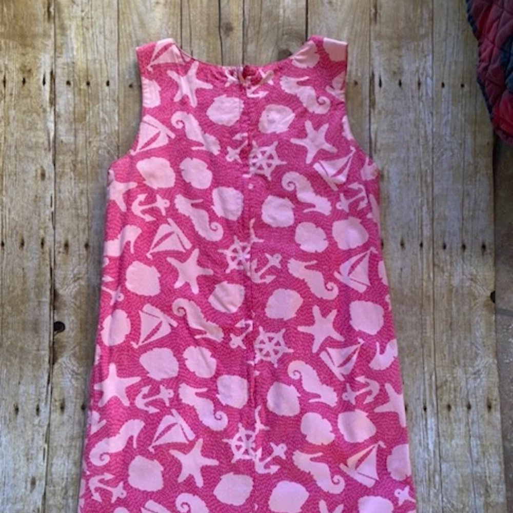 A Lilly Pulitzer dress in size 10. Pink and white